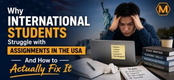 Stressed international student working on assignments in the USA with a laptop, books, and study notes, alongside the Statue of Liberty and a headline about overcoming academic challenges.